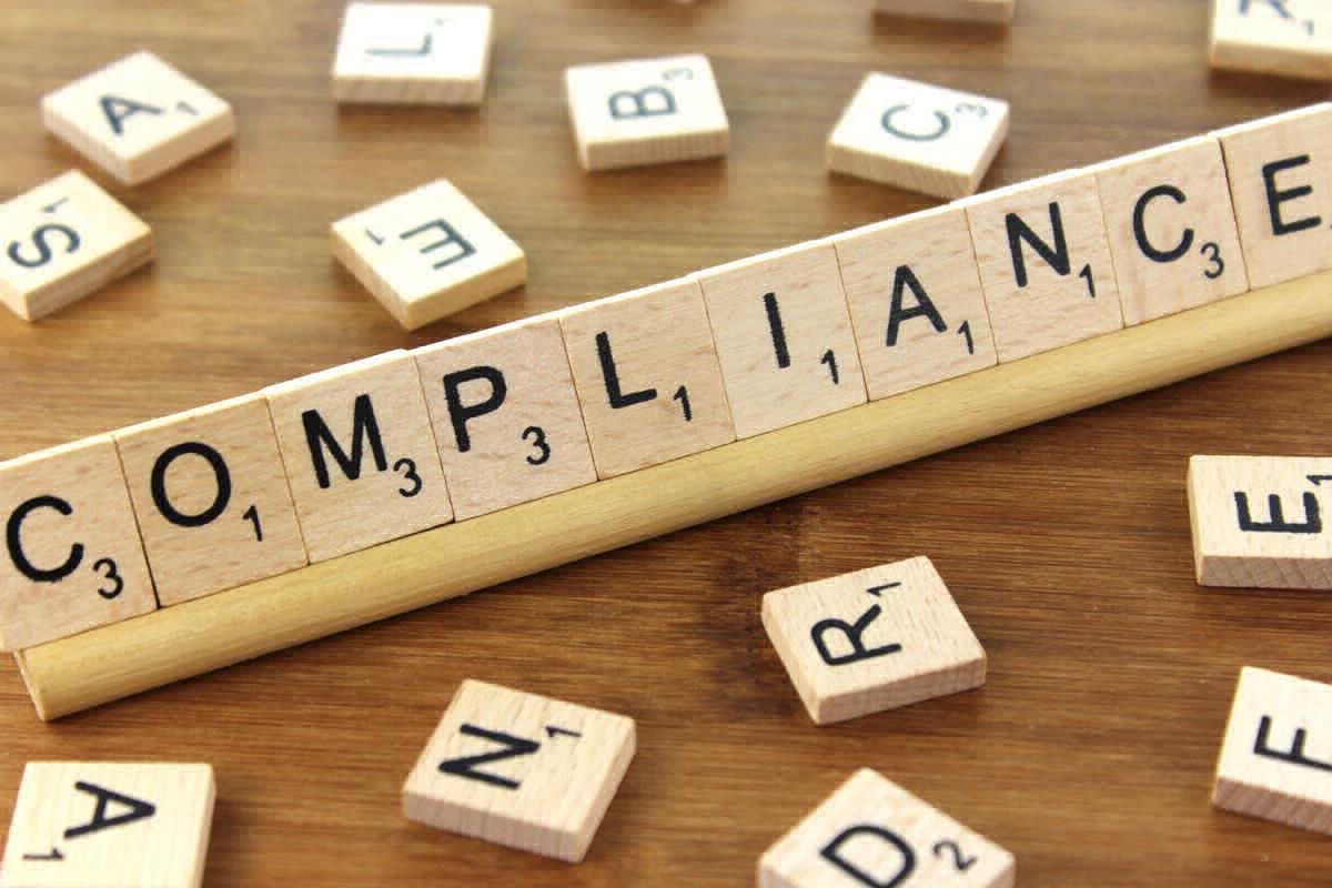 the word compliance spelled with letters